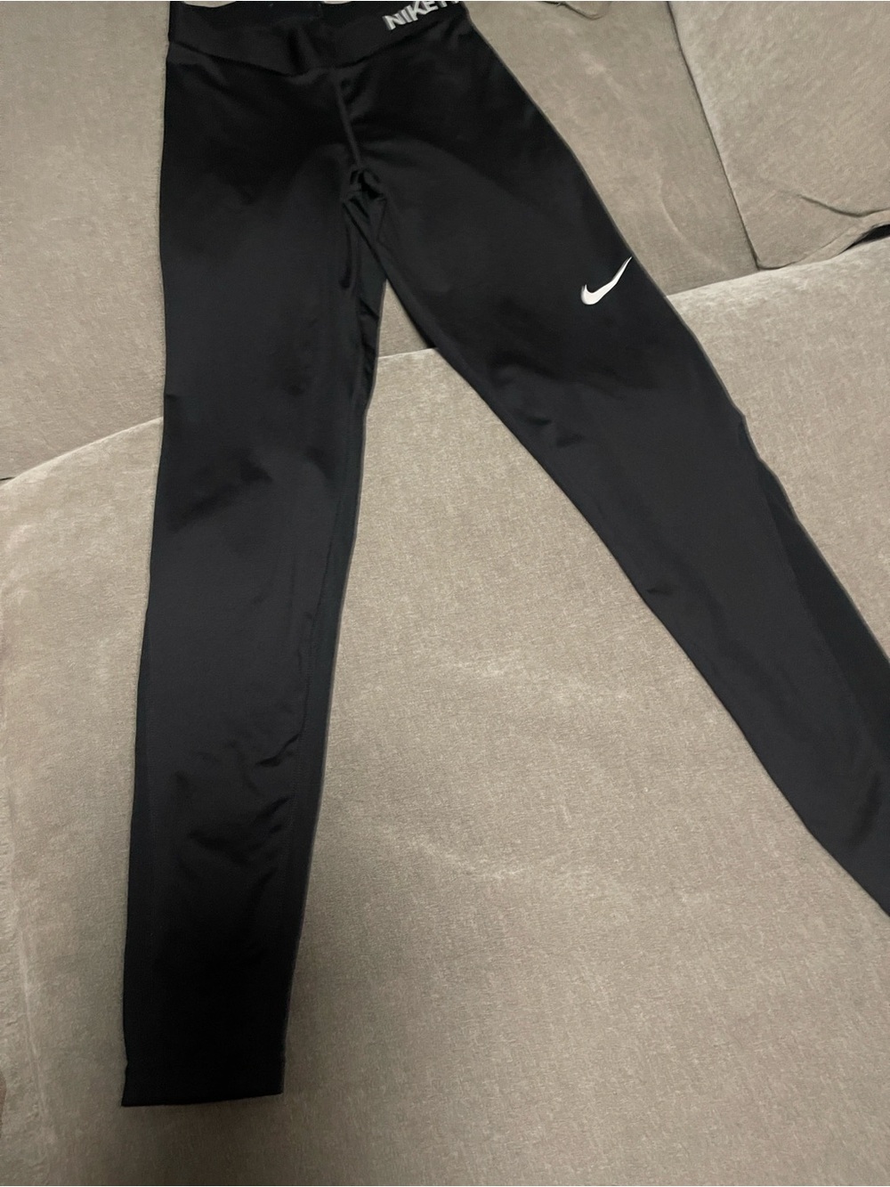 Nike Kids Black Performance Leggings with White Swoosh